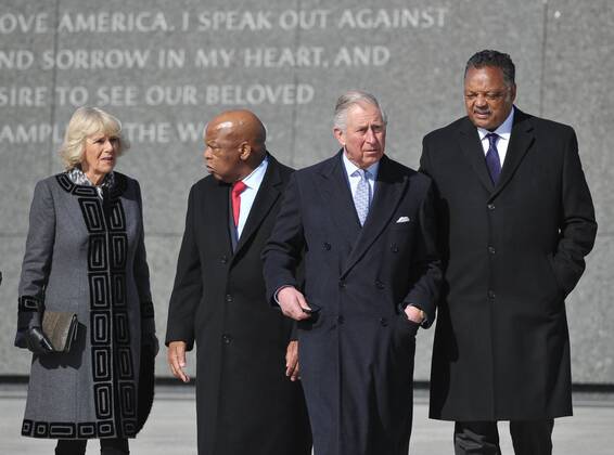 Britain s Prince Charles (2rd R) chats with civil rights leader Jesse Jackson while his wife Camilla (L), Duches of Cornwall chats with Rep John Lewis, D-GA, during a visit to the Martin Luther King Memorial Jr. Memorial on March 18, 2015 in Washington, DC. Prince Charles (C) and his wife Camilla, Duchess of Cornwall, are on a four-day trip to the United States. Pool  WAX20150318158 MANDELxNGAN