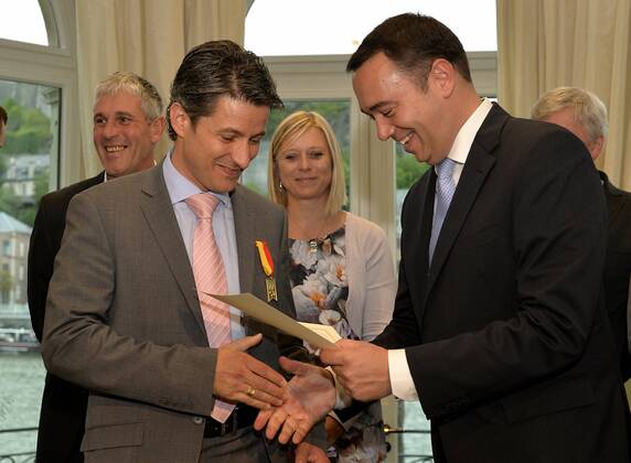- NAMUR, BELGIUM: Patrice Cani and Walloon Minister of Public Works, Road Safety, Health, Social Affairs, Family Allowances, Equal Chances, Economic Activities and Heritage Maxime Prevot pictured during the award ceremony for the Merite Wallons by the Walloon Government at the Elysette, in Jambes, Namur, Thursday 17 September 2015. ERICxLALMAND 04702129