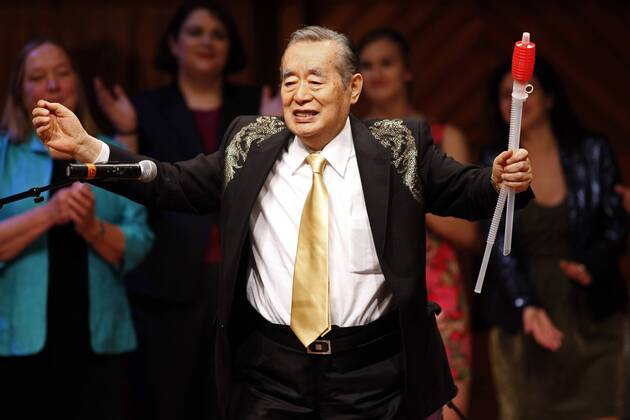 Japanese inventor Yoshiro Nakamatsu, also known as Dr. NakaMats, sings a song during the 2015 Ig Nobel Prize ceremony at Harvard University in Cambridge, Massachusetts on September 17, 2015. The prizes which are awarded by the Annals of Improbable Research are intended to celebrate the unusual, honor the imaginative and spur people s interest in science, medicine, and technology.  BOS2015091711 MATTHEWxHEALEY