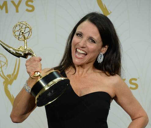 Julia Louis-Dreyfus holds her Emmy Award for outstanding lead actress in a comedy series for her portrayal of Selina Meyer on Veep at the 67th Primetime Emmy Awards in the Microsoft Theater in Los Angeles on September 20, 2015.  LAP2015092172 JIMxRUYMEN