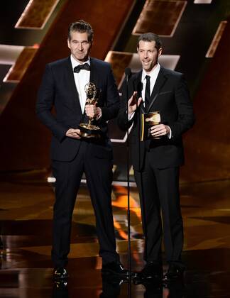 Writers David Benioff (L) and D.B. Weiss accept the award for Outstanding Writing for a Drama Series for Game of Thrones onstage during the 67th Primetime Emmy Awards in the Microsoft Theater in Los Angeles on September 20, 2015.  LAP20150920838 KENxMATSUI