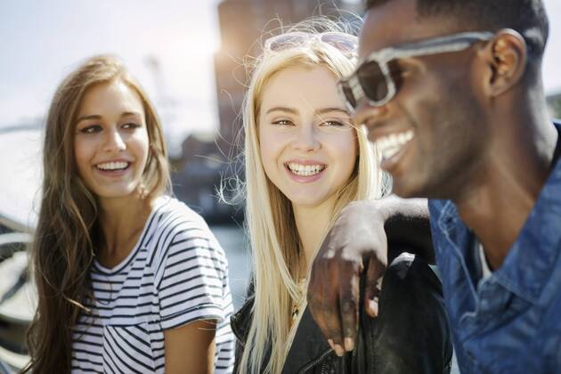 Germany, Duisburg, three young people having fun at Media Harbour GDF000881