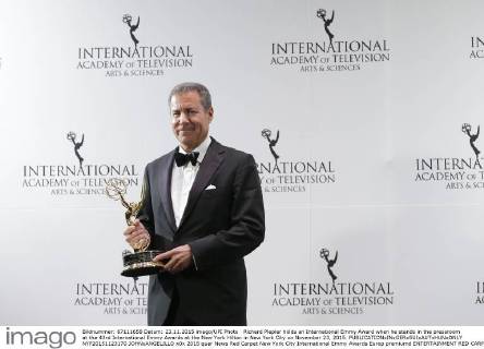 Richard Plepler holds an International Emmy Award when he stands in the pressroom at the 43rd International Emmy Awards at the New York Hilton in New York City on November 23, 2015.  NYP20151123170 JOHNxANGELILLO