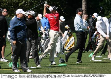 March 13, 2013 - Palm Harbor, Florida, U.S. - DOUGLAS R. CLIFFORD TIMES.Golfers work out at the driving range Wednesday (3 13 13) before competing in the Tampa Bay Championship at Innisbrook s Copperhead Golf Course in Palm Harbor. - ZUMAs70