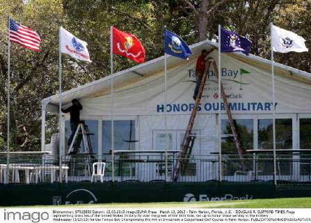 March 13, 2013 - Palm Harbor, Florida, U.S. - DOUGLAS R. CLIFFORD TIMES.Flags representing branches of the United States military fly over the green at the 16th hole, set up to honor those serving in the military Wednesday (3 13 13) for the Tampa Bay Championship Pro-Am at Innisbrook s Copperhead Golf Course in Palm Harbor. - ZUMAs70