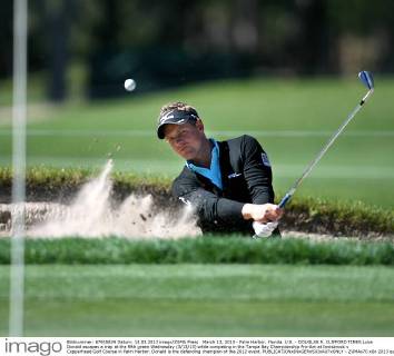 March 13, 2013 - Palm Harbor, Florida, U.S. - DOUGLAS R. CLIFFORD TIMES.Luke Donald escapes a trap at the fifth green Wednesday (3 13 13) while competing in the Tampa Bay Championship Pro-Am at Innisbrook s Copperhead Golf Course in Palm Harbor. Donald is the defending champion of the 2012 event. - ZUMAs70