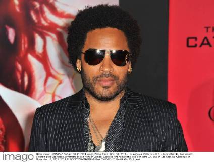 Nov. 18, 2013 - Los Angeles, California, U.S. - Lenny Kravitz, Zoe Kravitz attending the Los Angeles Premiere of The Hunger Games: Catching Fire held at the Nokia Theatre L.A. Live in Los Angeles, California on November 18, 2013. 2013 - ZUMAl89