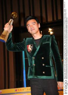 Top Ten Chinese Gold Songs Award in Hongkong HONG KONG, CHINA - JANUARY 07: (CHINA OUT) Singer and actor Kenny Bee poses after the 38th Top Ten Chinese Gold Songs Award on January 7, 2016 in Hong Kong, China.  CFP22366087sp