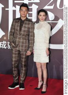 BEIJING, CHINA - JANUARY 07: (CHINA OUT) Actor Zheng Kai, and singer and actress Amber Kuo arrive at the red carpet of the 2015 Sina Weibo Award Ceremony at China World Trade Center Tower III on January 7, 2016 in Beijing, China.  CFP477916088