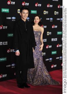 BEIJING, CHINA - JANUARY 07: (CHINA OUT) Actor Chen Xiao and girlfriend Michelle Chen arrive at the red carpet of the 2015 Sina Weibo Award Ceremony at China World Trade Center Tower III on January 7, 2016 in Beijing, China.  CFP477916111