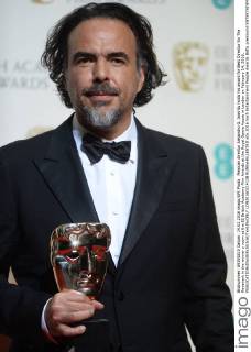 Mexican director Alejandro G. Inarritu holds his award for Best Director for The Revenant in the winner s room at the EE British Academy Film Awards at the Royal Opera House in London on February 14, 2016.  LON20160214138 RUNExHELLESTAD