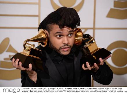 The Weeknd, winner of the Best R&B Performance award for Earned It, and Best Urban Contemporary Album award for Beauty Behind The Madness, appears backstage with the award for XXX during the 58th annual Grammy Awards held at Staples Center in Los Angeles on February 15, 2016.  LAP201602151047 PHILxMCCARTEN
