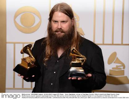 Chris Stapleton, winner of the Best Country Album award and Best Country Solo Performance award, appears backstage during the 58th annual Grammy Awards held at Staples Center in Los Angeles on February 15, 2016.  LAP201602151058 PHILxMCCARTEN