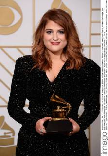 Singer Meghan Trainor, winner of the Best New Artist award, appears backstage with the award for XXX during the 58th annual Grammy Awards held at Staples Center in Los Angeles on February 15, 2016.  LAP201602151066 PHILxMCCARTEN