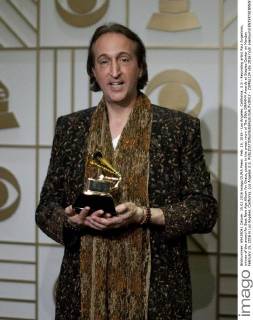 Feb. 15, 2016 - Los Angeles, California, U.S - Recording artist Paul Avgerinos, winner of the award for Best New Age Album for Grace, poses in the press room of The 58th GRAMMY Awards at Staples Center on Monday February 15, 2016 in Los Angeles, California. Los Angeles U.S. - ZUMAp124