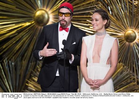 Feb 28, 2016 - Hollywood, California, U.S. - Sacha Baron Cohen and Olivia Wilde present during the live ABC Telecast of The 88th Oscars at the Dolby Theatre. Hollywood U.S. - ZUMAz03_