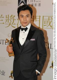 MACAU, CHINA - MARCH 08: (CHINA OUT) Actor Qin Hao attends the Gold Aries Award Of Macau International Film Festival on March 8, 2016 in Macau, China.  CFP480844646