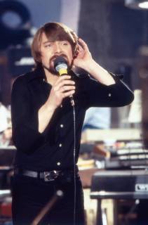 Jürgen von der Lippe Der deutsche Musiker und Komiker Jürgen von der Lippe mit seinem Programm Sing was Süßes , Deutschland 1970er Jahre. German musician and comedian Juergen von der Lippe with his stage programme Sing was Suesses , Germany 1970s. Copyright: Roba Schweigmann UnitedArchives21791