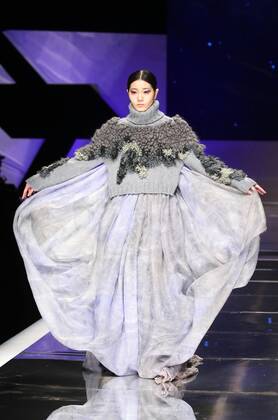BEIJING, CHINA - MARCH 25: (CHINA OUT) A model showcases designs on the runway at Hempel Award - the 24th China International Young Fashion Designers Contest during day one of the Mercedes-Benz China Fashion Week A W 16 17 Collection at Beijing Hotel on March 25, 2016 in Beijing, China.  CFP481722764