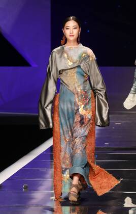 BEIJING, CHINA - MARCH 25: (CHINA OUT) A model showcases designs on the runway at Hempel Award - the 24th China International Young Fashion Designers Contest during day one of the Mercedes-Benz China Fashion Week A W 16 17 Collection at Beijing Hotel on March 25, 2016 in Beijing, China.  CFP481722772