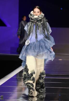 BEIJING, CHINA - MARCH 25: (CHINA OUT) A model showcases designs on the runway at Hempel Award - the 24th China International Young Fashion Designers Contest during day one of the Mercedes-Benz China Fashion Week A W 16 17 Collection at Beijing Hotel on March 25, 2016 in Beijing, China.  CFP481722775