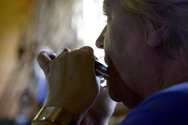 Sep. 30, 2011 - Clarksdale, Mississippi, U.S. - KATE WAKELING, 56, has travelled three times in a year from Australia to attend Blues Harmonica Jam Camp in Clarksdale, Mississippi. I am obsessed she said while trying to gently coax bended notes out of her C harp. - ZUMAf103