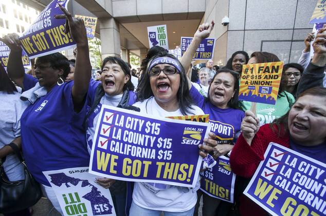 April 4, 2016 - Los Angeles, California, U.S - Supporters rally as Governor Jerry Brown joins supporters from across the state in Los Angeles on Monday April 4, 2016, to sign landmark legislation passed by both houses of the Legislature last week Ã SB 3. The SB 3 makes California the first state in the nation to commit to raising the minimum wage to $15 per hour statewide. Under the plan, minimum wage will rise to $10.50 per hour on January 1, 2017 for businesses with 26 or more employees, and then rises each year until reaching $15 per hour in 2022. This plan also recognizes the contributions of small businesses Ã those with 25 or fewer employees Ã to California s economy and allows additional time for these employers to phase in the increases. Los Angeles U.S. - ZUMAc68_