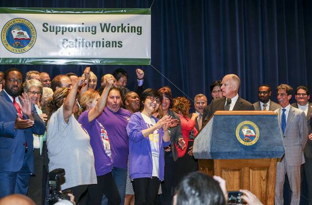 April 4, 2016 - Los Angeles, California, U.S - Governor Jerry Brown joins supporters from across the state in Los Angeles on Monday April 4, 2016, to sign landmark legislation passed by both houses of the Legislature last week Ã SB 3. The SB 3 makes California the first state in the nation to commit to raising the minimum wage to $15 per hour statewide. Under the plan, minimum wage will rise to $10.50 per hour on January 1, 2017 for businesses with 26 or more employees, and then rises each year until reaching $15 per hour in 2022. This plan also recognizes the contributions of small businesses Ã those with 25 or fewer employees Ã to California s economy and allows additional time for these employers to phase in the increases. Los Angeles U.S. - ZUMAc68_