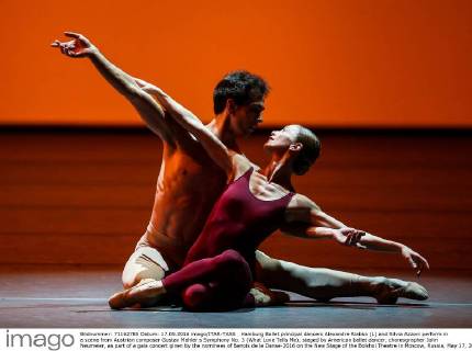 Hamburg Ballet principal dancers Alexandre Riabko (L) and Silvia Azzoni perform in a scene from Austrian composer Gustav Mahler s Symphony No. 3 (What Love Tells Me), staged by American ballet dancer, choreographer John Neumeier, as part of a gala concert given by the nominees of Benois de la Danse-2016 on the New Stage of the Bolshoi Theatre in Moscow, Russia, May 17, 2016. Sergei Bobylev TASS  TS023803