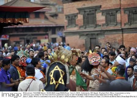 June 4, 2016 - Kathmandu, NP, Nepal - Prashant Mali, 23yrs, impersonate as deity Vaishnavi carry sheep for the ritual sacrificial procession during 12 year Shree Bagh Bhairab Dance Jatra Celebrated at Patan, Nepal on June 4, 2016. Which is celebrated once every 12 years in different places of Kirtipur, Kathmandu and Patan. It is known as Barha Barse Shree Bagh Bhairab Jatra in local Nepali language. Kathmandu Nepal  - ZUMAn230
