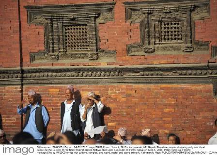 June 4, 2016 - Kathmandu, NP, Nepal - Nepalese people observing religious ritual dance during 12 year Shree Bagh Bhairab Dance festival (not seen in picture) at Patan, Nepal on June 4, 2016. Patan listed as a World Heritage Site by UNESCO for its rich culture, temples, and wood, metal and stone artwork. Kathmandu Nepal  - ZUMAn230