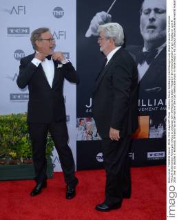 Directors Steven Spielberg (L) and George Lucas attend American Film Institutes 44th Life Achievement Award gala tribute to composer John Williams at the Dolby Theatre in the Hollywood section of Los Angeles on June 9, 2016. Over six decades in Hollywood, Williams has written some of the most memorable music in movie history. His 100-plus features have earned 50 Academy Award nominations (making him the most-nominated living person), winning five times. Williams also received 22 Grammys, seven BAFTAs, five Emmys, four Golden Globes, a Kennedy Center Honor and the National Medal of Arts. And then there are all those iconic themes, the ones everyone in the world knows.  LAP2016060920 JIMxRUYMEN