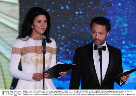 ST PETERSBURG, RUSSIA - JUNE 17, 2016: Journalist Inga Yumasheva (L) and scientist Ilya Kolmanovsky at the Global Energy International Prize 2016 Award Ceremony as part of the 20th St. Petersburg International Economic Forum at the ExpoForum Convention and Exhibition Centre at the Global Energy International Prize 2016 Award Ceremony as part of the 20th St. Petersburg International Economic Forum at the ExpoForum Convention and Exhibition Centre. Sergei Savostyanov TASS  TS026E5B