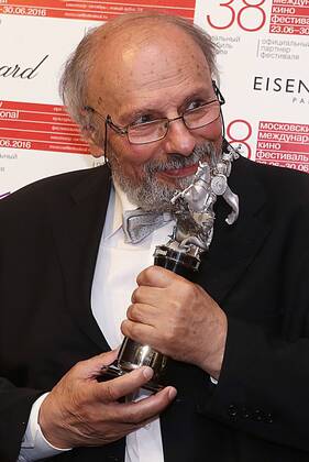 MOSCOW, RUSSIA - JUNE 30, 2016: Director Radoslav Spassov with the Silver George special award for his film The Singing Shoes at the closing of the 38th Moscow International Film Festival. Vyacheslav Prokofyev TASS  TS02887C