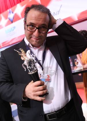MOSCOW, RUSSIA - JUNE 30, 2016: Director Reza Mirkarimi with the Golden George award main prize for the best film for his film Daughter at the closing of the 38th Moscow International Film Festival. Vyacheslav Prokofyev TASS  TS0288A7