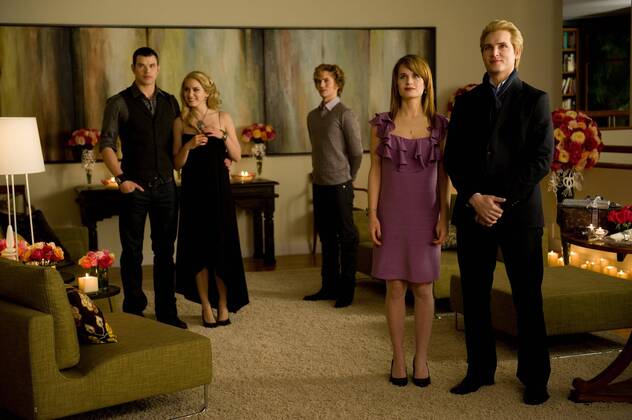 RELEASE DATE: November 20, 2009. MOVIE TITLE: Twilight: New Moon. STUDIO: Imprint Entertainment. PLOT: After Bella recovers from the vampire attack that almost claimed her life, she looks to celebrate her birthday with Edward and his family. However, a minor accident during the festivities results in Bella s blood being shed, a sight that proves too intense for the Cullens, who decide to leave the town of Forks, Washington for Bella and Edward s sake. Initially heartbroken, Bella finds a form of comfort in reckless living, as well as an even-closer friendship with Jacob Black. Danger in different forms awaits. PICTURED: PETER FACINELLI as Dr. Carlisle Cullen, ELIZABETH REASER as Esme Cullen, KELLAN LUTZ as Emmett Cullen and JACKSON RATHBONE as Jasper Hale. - ZUMAg90_
