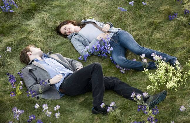 RELEASE DATE: November 20, 2009. MOVIE TITLE: Twilight: New Moon. STUDIO: Imprint Entertainment. PLOT: After Bella recovers from the vampire attack that almost claimed her life, she looks to celebrate her birthday with Edward and his family. However, a minor accident during the festivities results in Bella s blood being shed, a sight that proves too intense for the Cullens, who decide to leave the town of Forks, Washington for Bella and Edward s sake. Initially heartbroken, Bella finds a form of comfort in reckless living, as well as an even-closer friendship with Jacob Black. Danger in different forms awaits. PICTURED: KRISTEN STEWART as Bella Swan and ROBERT PATTINSON as Edward Cullen. - ZUMAg90_
