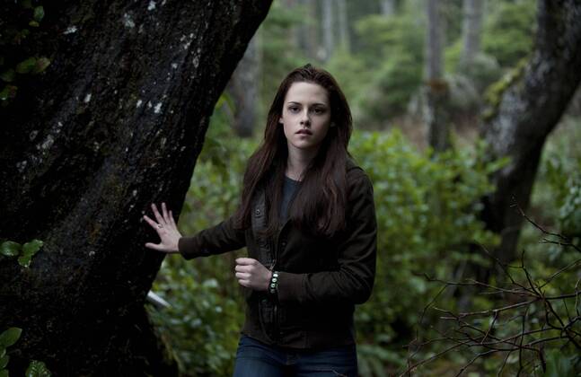 RELEASE DATE: November 20, 2009. MOVIE TITLE: Twilight: New Moon. STUDIO: Imprint Entertainment. PLOT: After Bella recovers from the vampire attack that almost claimed her life, she looks to celebrate her birthday with Edward and his family. However, a minor accident during the festivities results in Bella s blood being shed, a sight that proves too intense for the Cullens, who decide to leave the town of Forks, Washington for Bella and Edward s sake. Initially heartbroken, Bella finds a form of comfort in reckless living, as well as an even-closer friendship with Jacob Black. Danger in different forms awaits. PICTURED: KRISTEN STEWART as Bella Swan. - ZUMAg90_