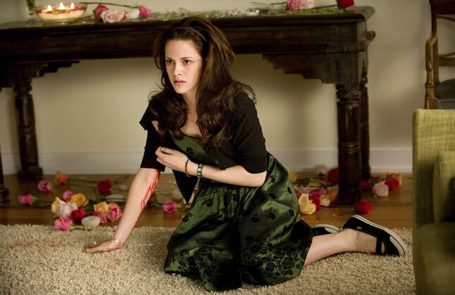 RELEASE DATE: November 20, 2009. MOVIE TITLE: Twilight: New Moon. STUDIO: Imprint Entertainment. PLOT: After Bella recovers from the vampire attack that almost claimed her life, she looks to celebrate her birthday with Edward and his family. However, a minor accident during the festivities results in Bella s blood being shed, a sight that proves too intense for the Cullens, who decide to leave the town of Forks, Washington for Bella and Edward s sake. Initially heartbroken, Bella finds a form of comfort in reckless living, as well as an even-closer friendship with Jacob Black. Danger in different forms awaits. PICTURED: KRISTEN STEWART as Bella Swan. - ZUMAg90_