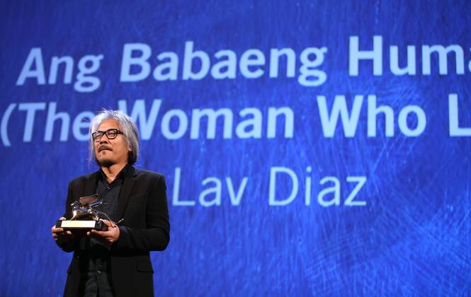 VENICE, Sept. 10, 2016 -- Director Lav Diaz holds the Golden Lion prize for his movie The Woman Who Left during the award ceremony at the 73rd Venice Film Festival, at the Lido of Venice, Italy, Sept. 10, 2016. The Woman Who Left by Philippine director Lav Diaz won the Golden Lion, the highest prize presented at the 73rd Venice International Film Festival which concluded here on Saturday evening. )(axy) ITALY-VENICE-73RD FILM FESTIVAL-AWARD JinxYu 