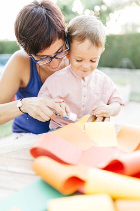 Mother and son doing handicrafts together model released Symbolfoto property released  JRFF000846