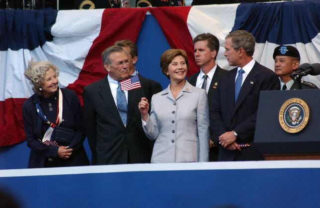 September 11, 2002 - Washington, DC, United States - U.S. President George W. Bush, First Lady Laura Bush, Secretary of Defense Donald Rumsfeld and wife Joyce Rumsfeld attend the September 11 Memorial Service at the Pentagon September 11, 2002 in Washington, DC. Washington United States - ZUMAp138 20020911_zaa_p138_001