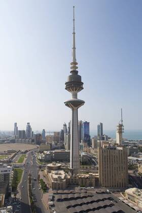 Elevated view of the modern city skyline and central business district with Liberation Tower, Kuwait City, Kuwait, Middle East Copyright: GavinxHellier 794-3761