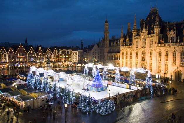 Ice Rink and Christmas Market in the Market Square, Bruges, West Vlaanderen (Flanders), Belgium, Europe Copyright: StuartxBlack 846-1239