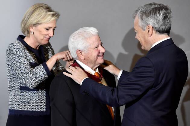 Princess Astrid of Belgium, Lee Roy Mitchell, Founder and Chairman of the Board Cinemark and Vice-Prime Minister and Foreign Minister Didier Reynders pictured during a bestowing of the honorary distinction of Commander in the Order of the Crown pictured during a visit to Cinemark on the fourth day of the economic mission of Belgium s Princess Astrid in Texas, United States, Tuesday 06 December 2016, in Austin.  DIRKxWAEM 04991736