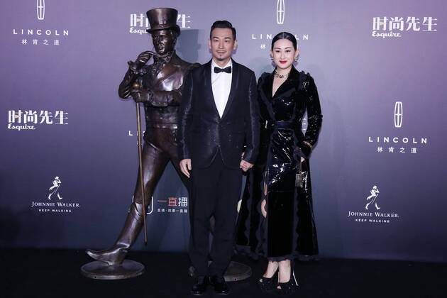 BEIJING, CHINA - DECEMBER 07: Actor Vincent Zhao Wenzhuo and wife Zhang Danlu pose on the red carpet of the 13th Man At His Best Award at the Worker s Stadium on December 7, 2016 in Beijing, China.  CFP496717248