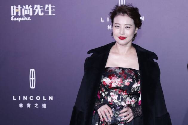 BEIJING, CHINA - DECEMBER 07: Actress Kathy Chow Hoi-Mei poses on the red carpet of the 13th Man At His Best Award at the Worker s Stadium on December 7, 2016 in Beijing, China.  CFP496717249