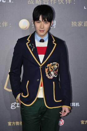 BEIJING, CHINA - DECEMBER 07: Actor Chen Xuedong poses on the red carpet of the 13th Man At His Best Award at the Worker s Stadium on December 7, 2016 in Beijing, China.  CFP496717258