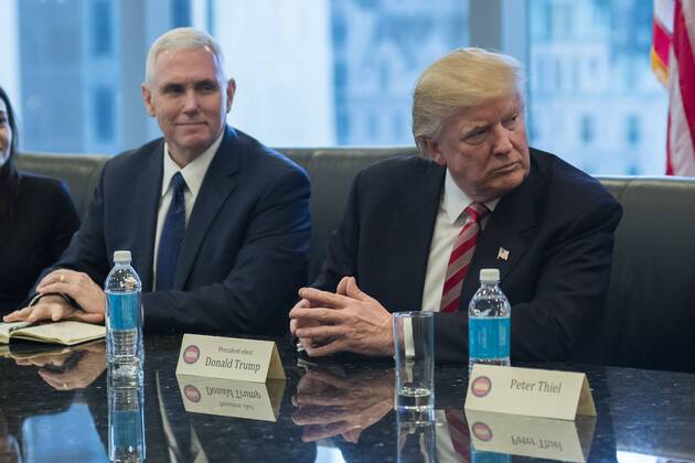 December 14, 2016 - New York, New York, United States of America - United States President-elect Donald Trump (R) and US Vice President-elect Mike Pence (L) are seen at a meeting of technology leaders in the Trump Organization conference room at Trump Tower in New York, NY, USA on December 14, 2016. . New York United States of America - ZUMAs152 20161214_zaa_s152_040
