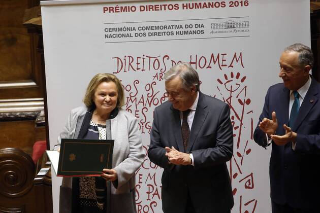 December 23, 2016 - Lisbon, Portugal - Newly sworn-in Secretary General of the United Nations Antonio Guterres (C ) passes on his human rights award to Refugees Portuguese Council President Teresa Tito de Morais (L) during a ceremony at the Parliament in Lisbon, Portugal, on December 23 2016. This year s award was given to Antonio Guterres, Secretary-General of the United Nations, for his work in the defense of human rights, especially in the discharge of the duties of United Nations High Commissioner for Refugees (UNHCR). This Prize is awarded annually by the President of the Assembly of the Republic, after hearing the Conference of Leaders, on the proposal of the jury constituted by the Committee on Constitutional Affairs, Rights, Freedoms and Guarantees. Photo: . Lisbon Portugal - ZUMAf123 26649058sp